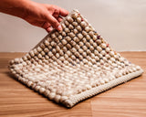 Taupe beige chunky loop wool rug, flat lay view