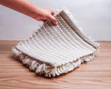 Ivory rug corner detail showing edge