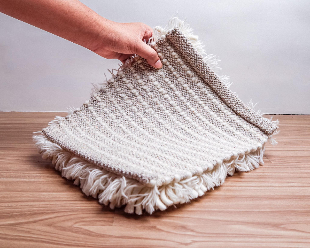 Ivory rug corner detail showing edge