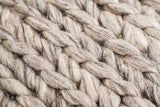 Close-up of chunky braided wool loop pile texture