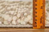Taupe rug corner detail showing edge