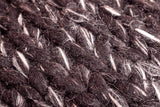 Close-up of chunky braided wool loop texture