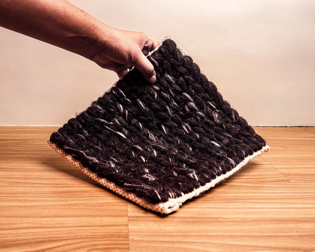 Cola brown chunky braided wool rug flat view