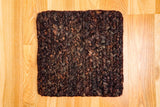 Wool rug pattern detail close-up