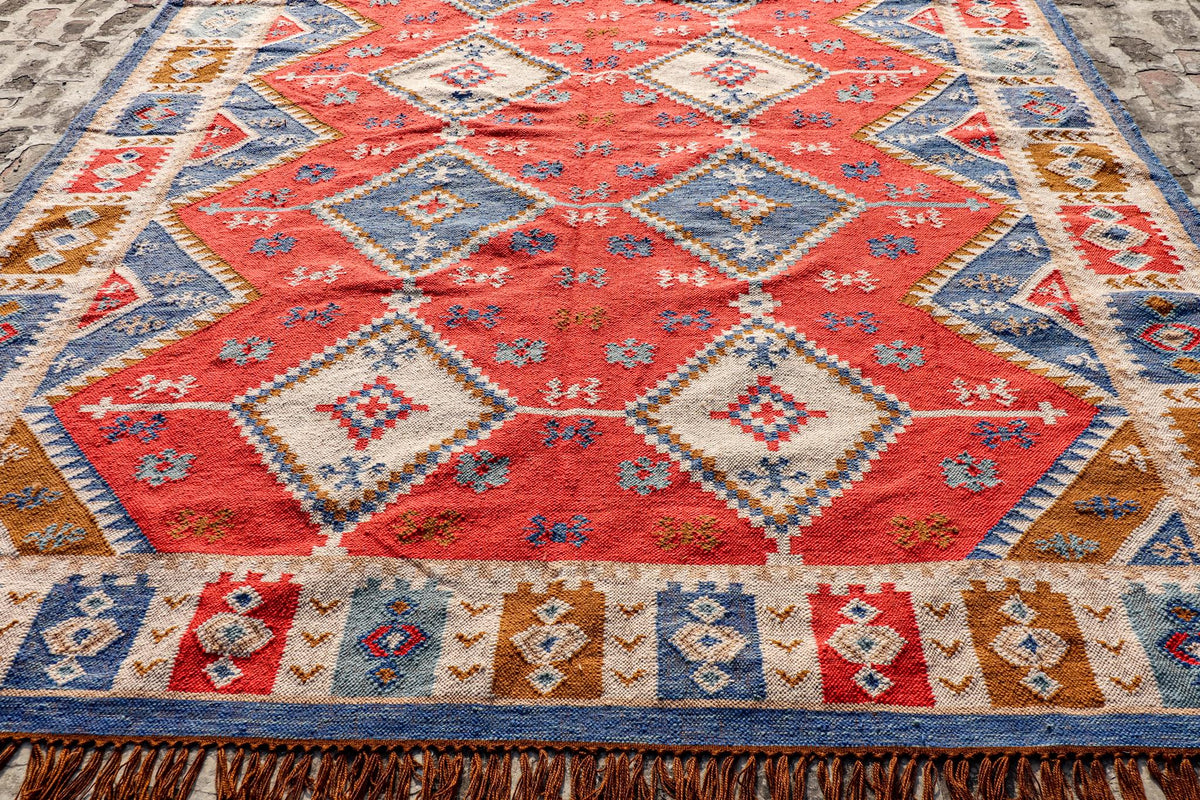 Southwestern kilim rug styled in a living room setting