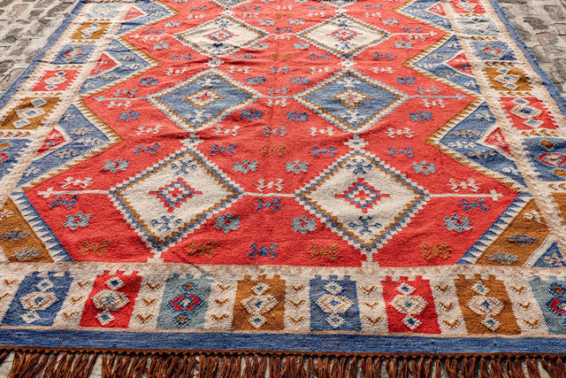 Southwestern kilim rug styled in a living room setting