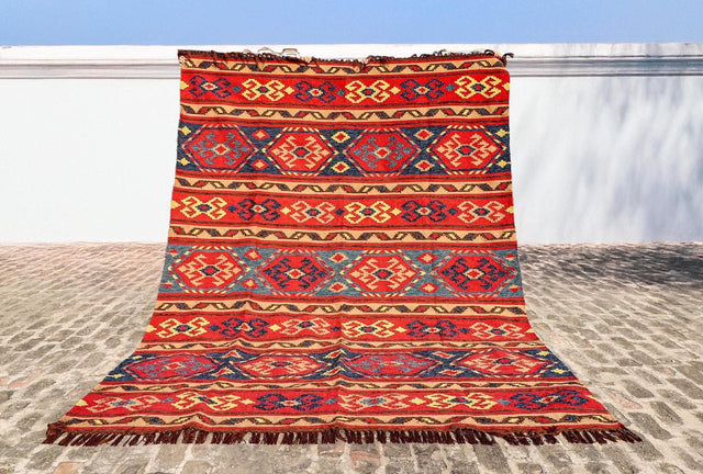 Red Afghan style kilim rug flat view showing full pattern