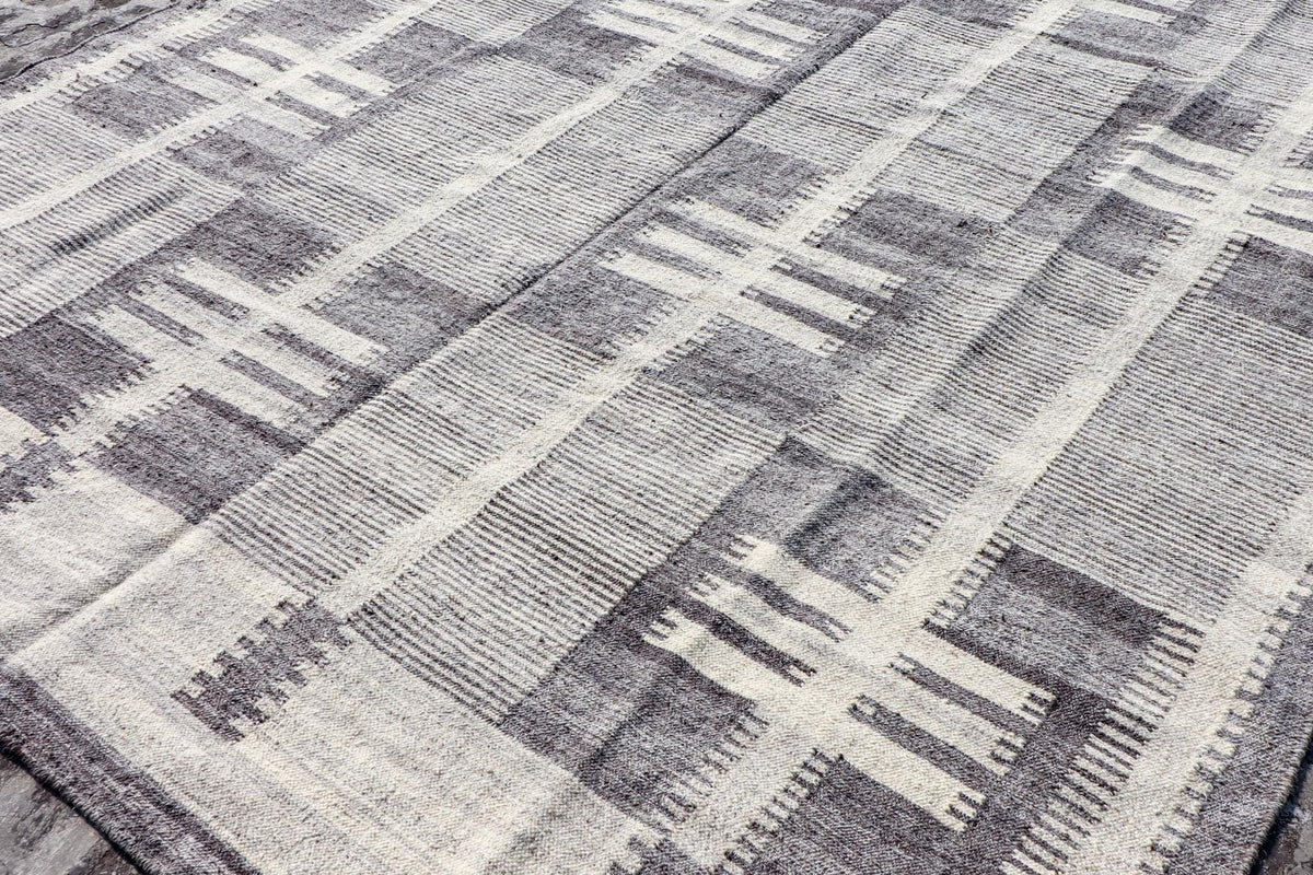 Grey beige rug corner detail