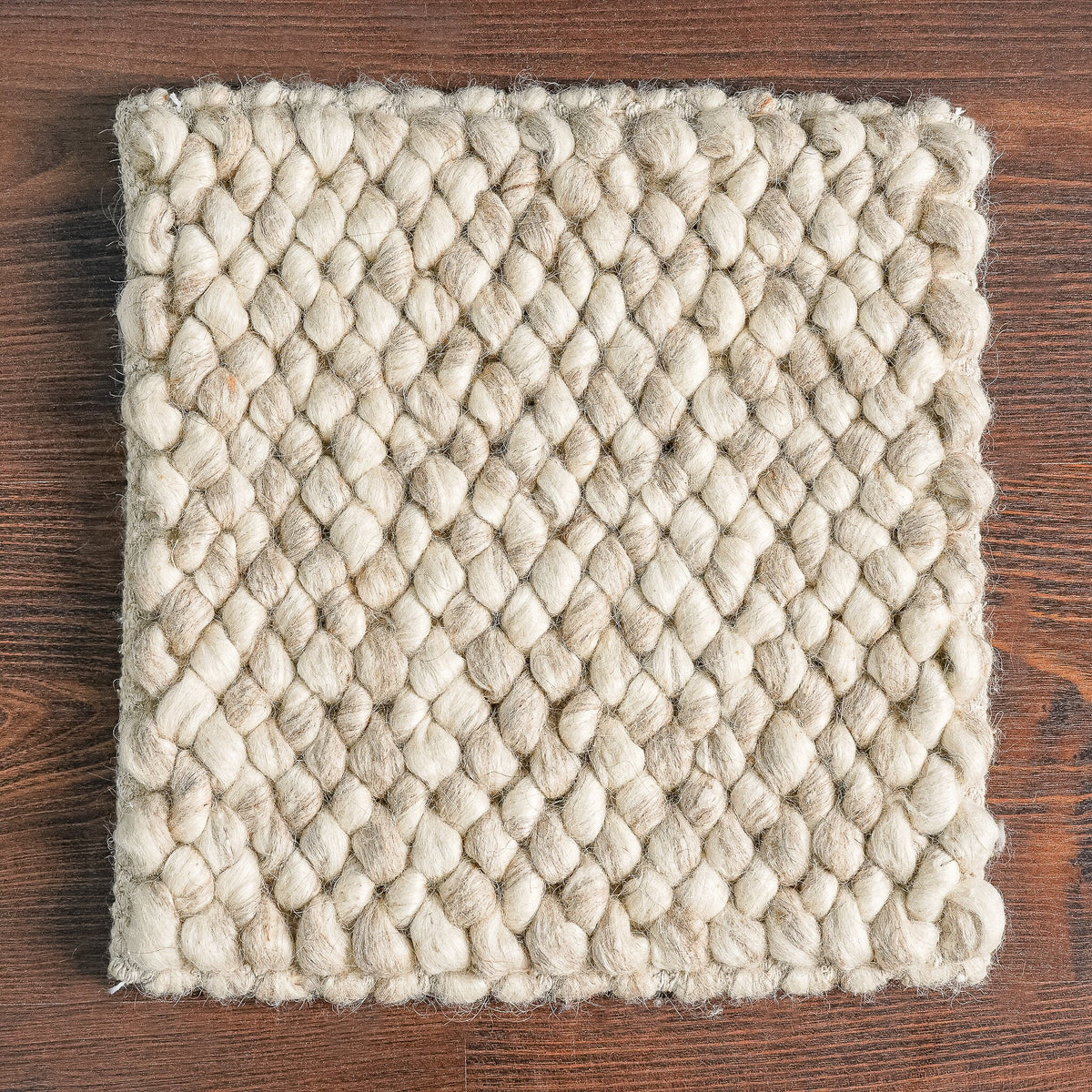 Taupe chunky looped wool rug, flat lay view