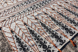 Tribal kilim rug styled with modern furniture