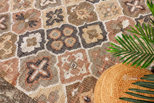 Black beige jute rug styled in a living room