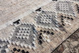 Beige tribal rug edge detail