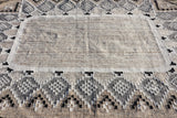 Oval indoor outdoor rug on a covered porch