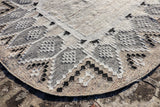 Beige oval rug corner detail