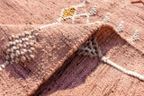 Pink kilim rug corner detail