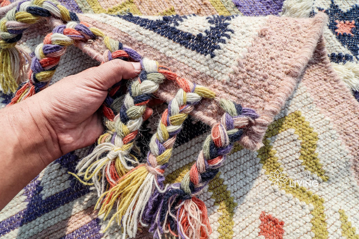 Full flat lay of mauve purple kilim rug