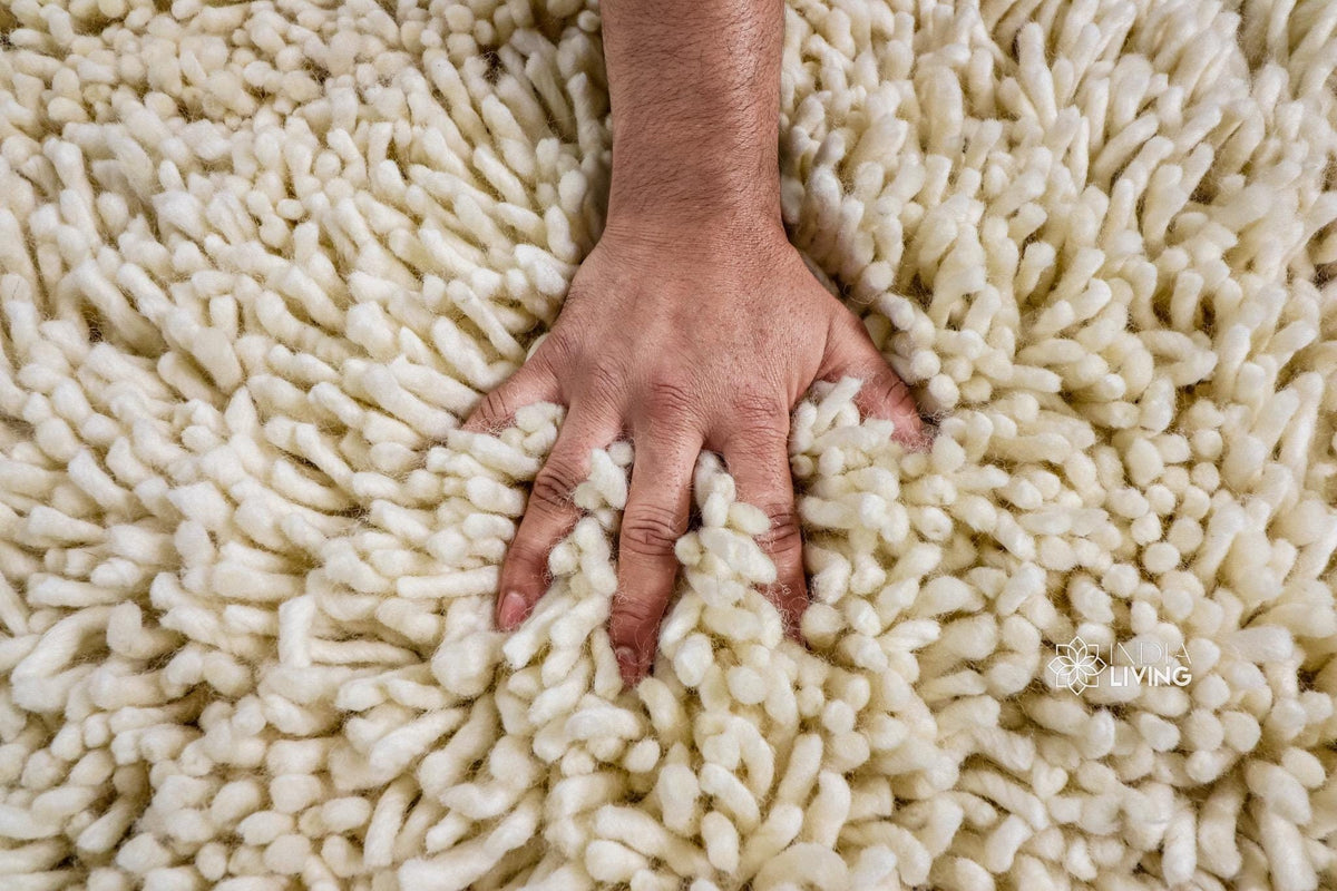 Natural ivory shag wool rug flat view showing plush texture