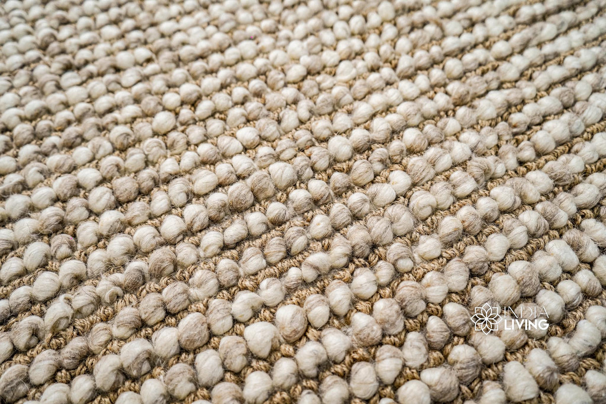 Chunky wool rug styled beside furniture