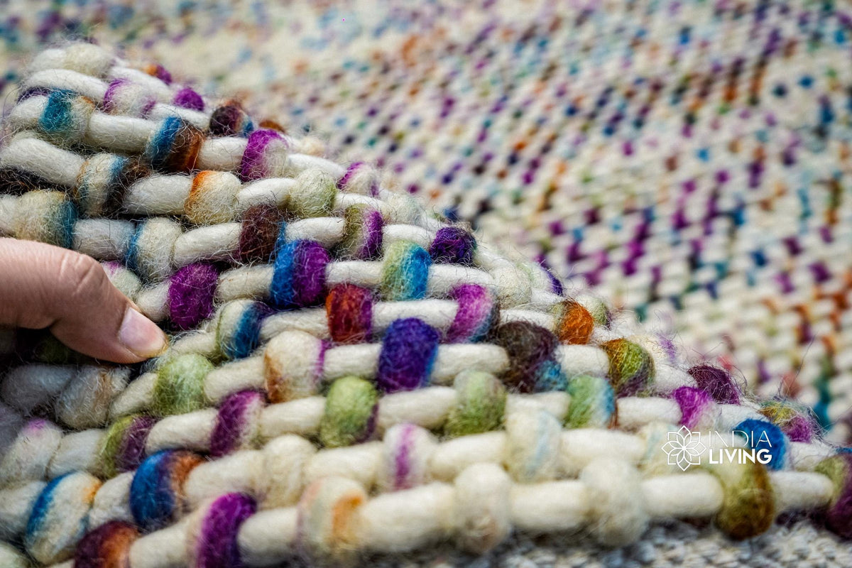 Rainbow wool rug pile texture close-up