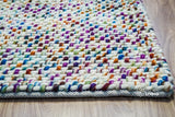 Basket knit wool rug pattern detail close-up