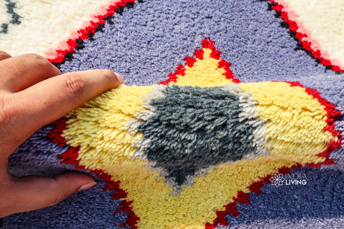 Colourful rug corner detail with fringe edge
