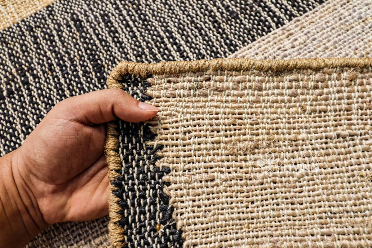 Corner detail of handwoven minimalist jute rug