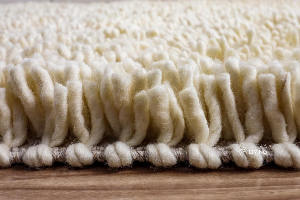 Ivory rug corner detail showing felted shag pile