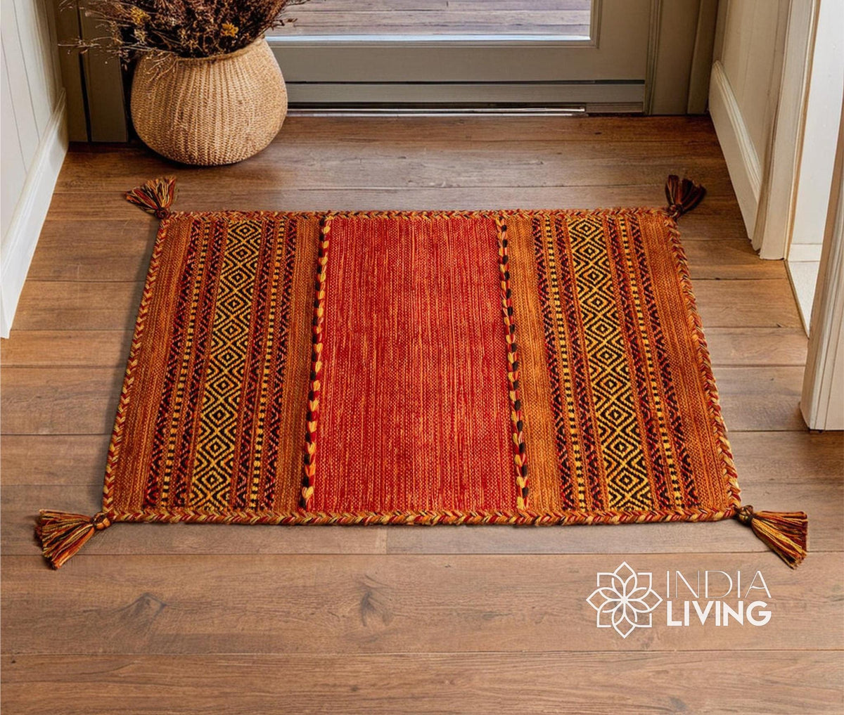 Orange kilim rug styled in a living room