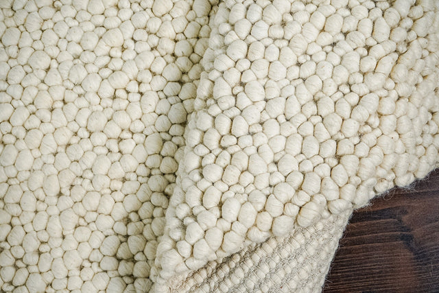 Ivory chunky rug flat lay full view
