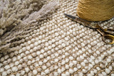 Camel beige rug styled with a pet nearby
