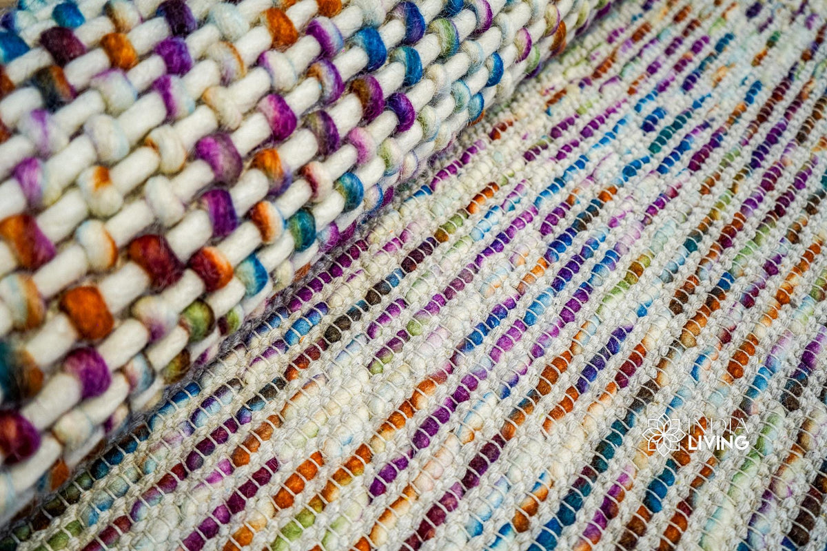 Rainbow wool rug corner detail showing edge