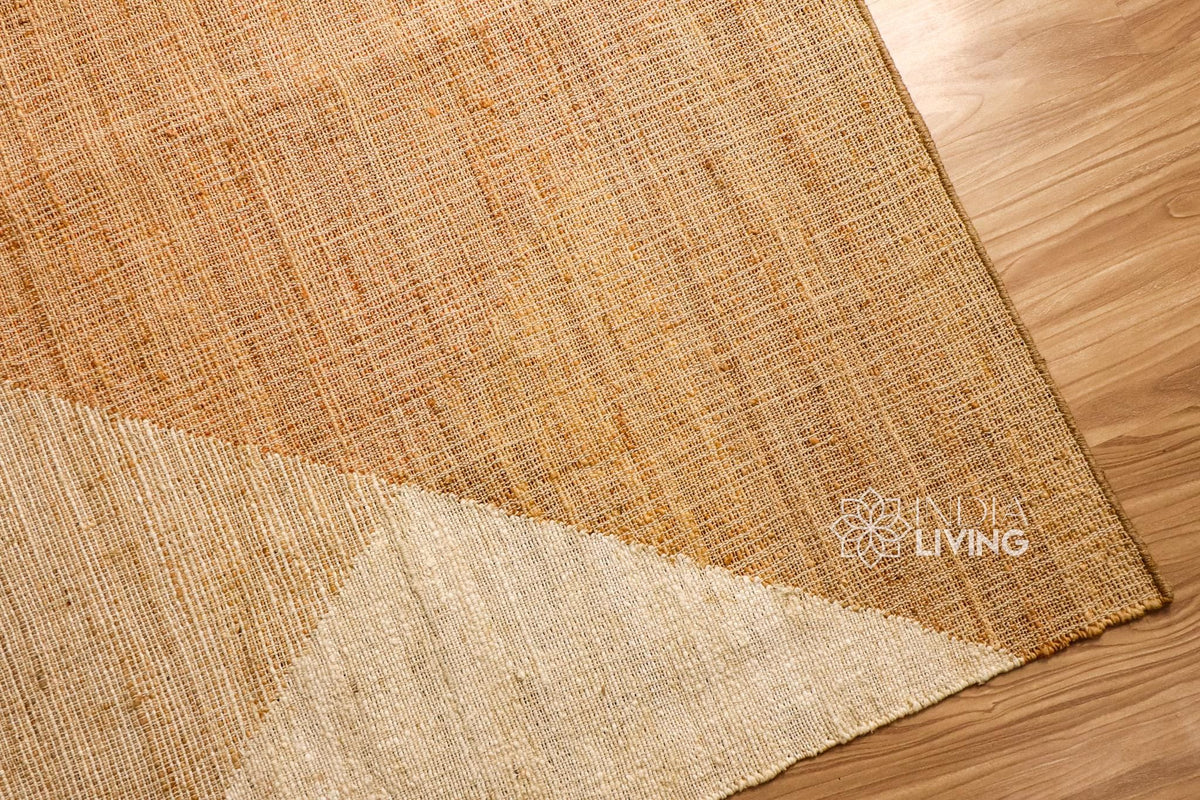 Corner detail of handwoven abstract jute rug