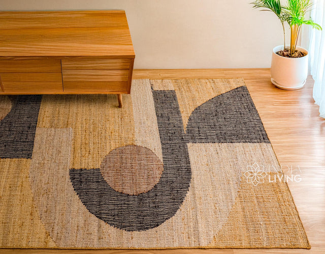 Jute rug styled in a minimalist living room