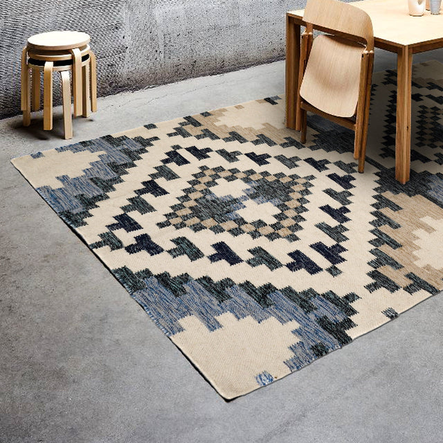 Beige blue abstract wool kilim rug, flat lay view