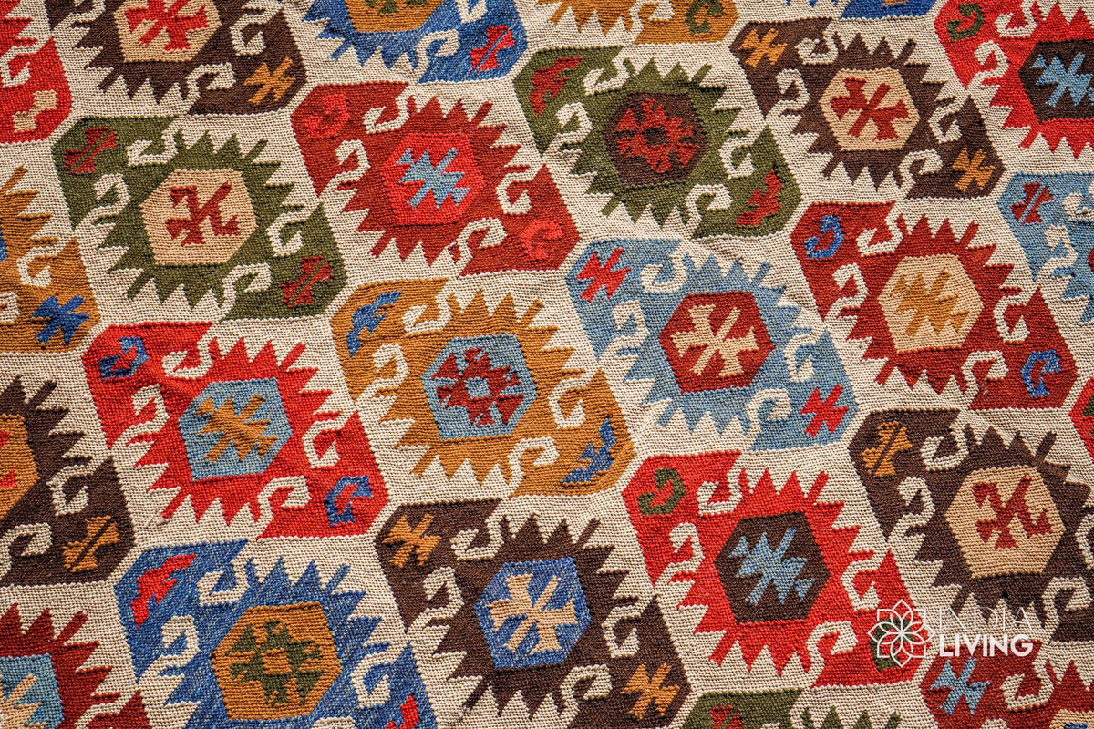 Aztec kilim rug styled on a patio setting