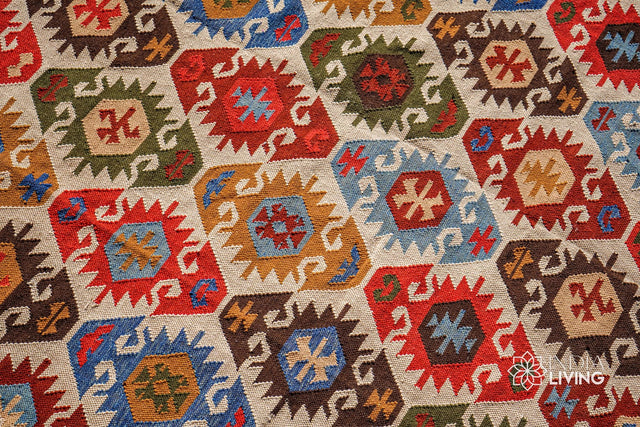 Aztec kilim rug styled on a patio setting