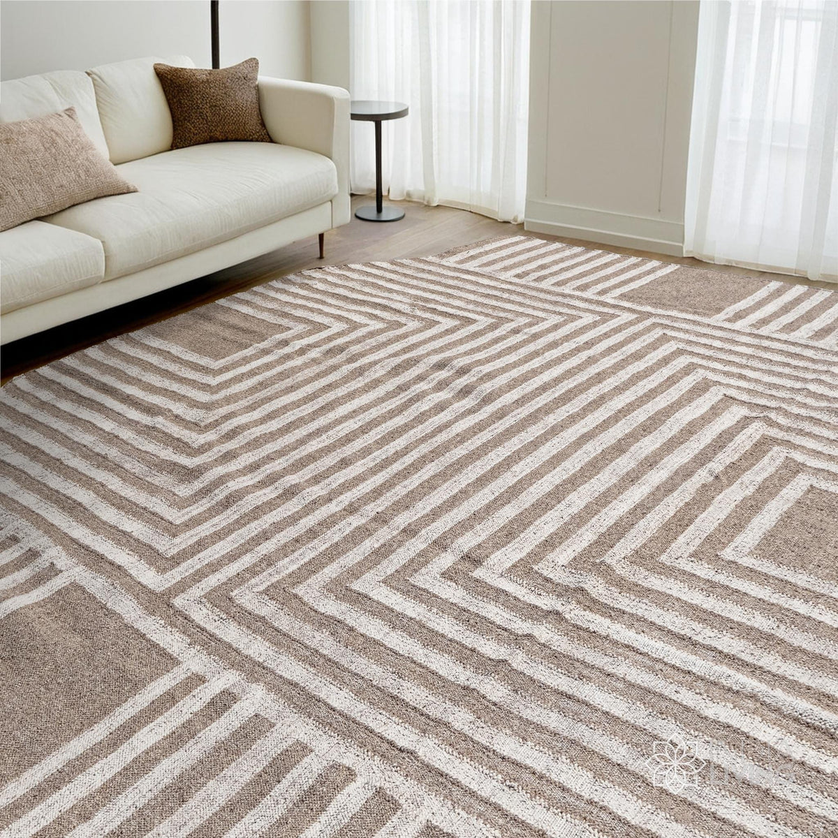 Close-up of handwoven texture on beige rustic rug