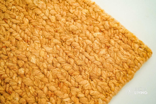 Orange textured chunky wool rug, flat lay view