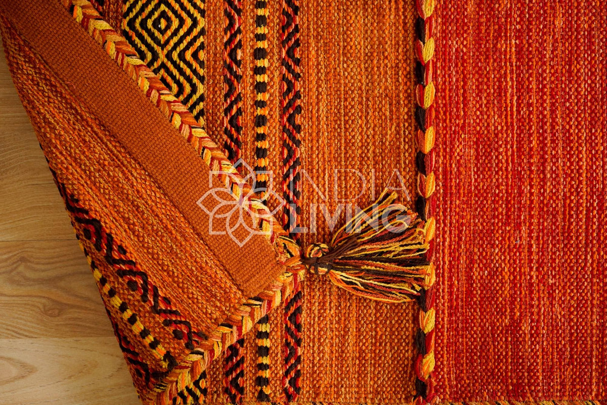 Orange kilim rug pile close-up texture