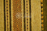 Green kilim rug shown at an alternate angle
