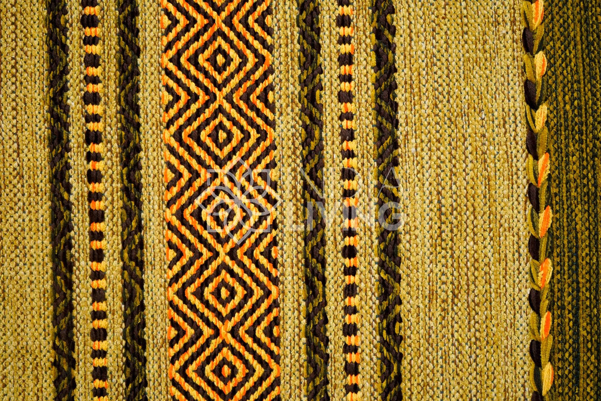 Green kilim rug shown at an alternate angle