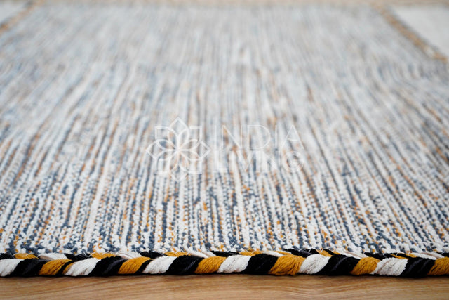 Ivory kilim rug styled in a living room