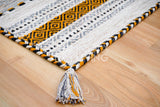 Close-up of cotton chenille weave on ivory kilim rug