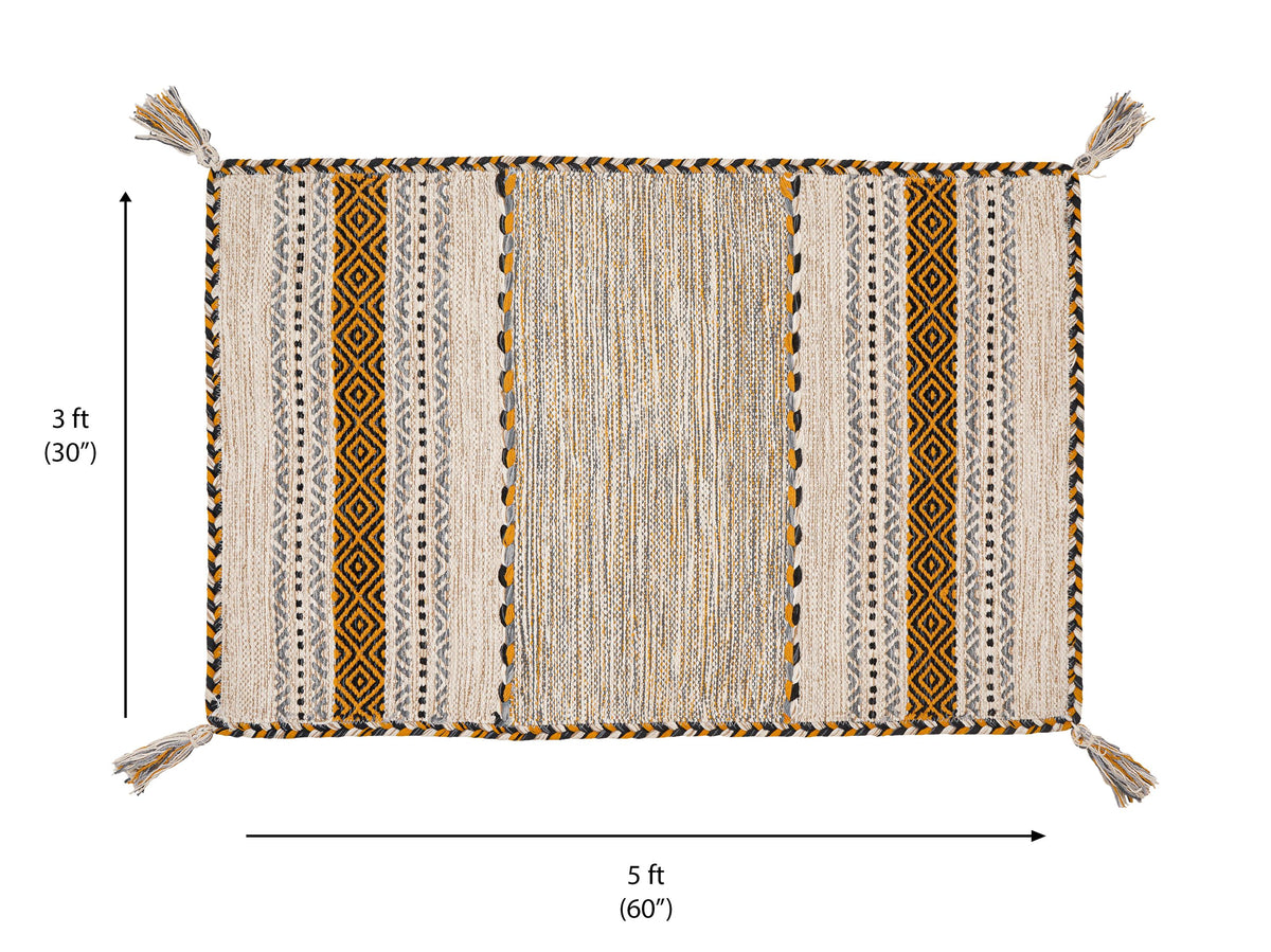 Overhead view of ivory kilim rug