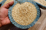 Scalloped jute rug in a hallway setting