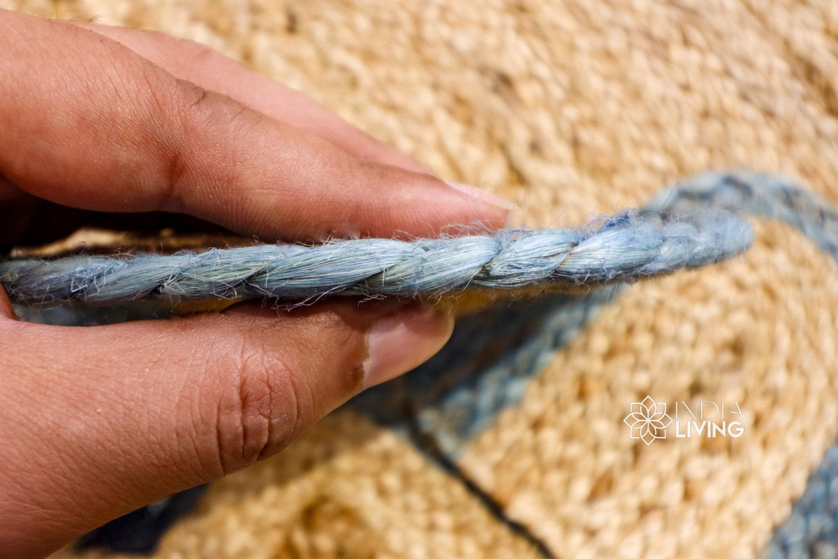 Jute rug corner detail with aqua trim