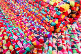 Rainbow chindi rag rug, flat lay view