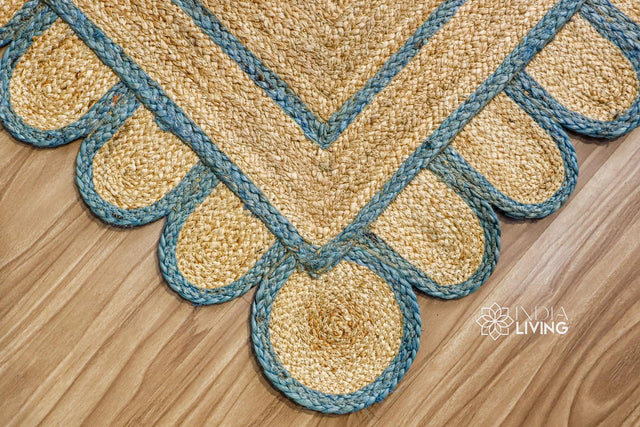 Aqua blue jute rug styled in a living room