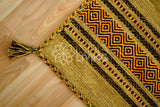 Green kilim rug corner detail