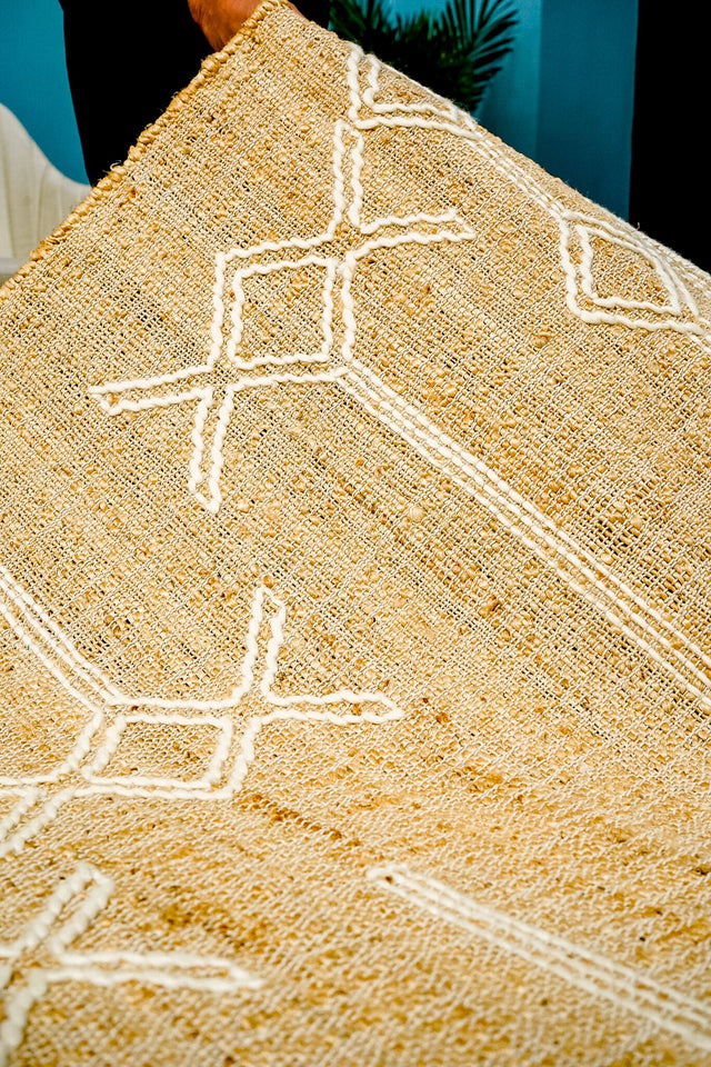 Wool jute rug styled in a modern living room